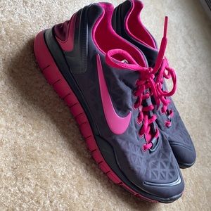 Nike dark grey and pink tennis shoes, size 9.5